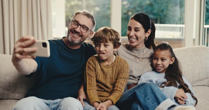 Happy, family and silly selfie in home for weekend memory, bonding or funny picture together. Mom, dad and playful children with goofy smile for photography, comedy or holiday humor on sofa in house