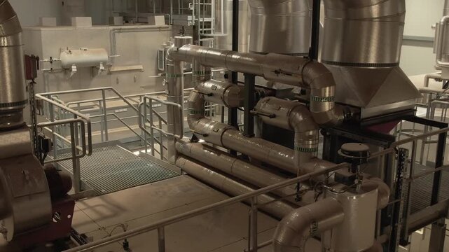 Process machines with hopper on steel platform with grating