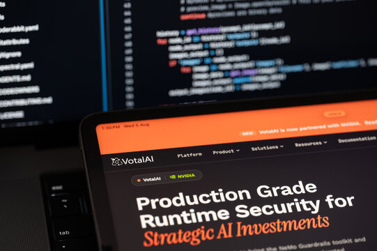 Votal Ai company web page on program code background