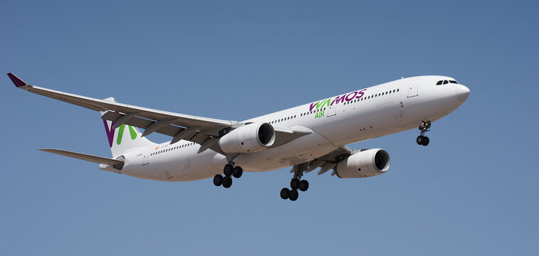 Tenerife, Spain august 14st, 2026. Airbus A330-343 Wamos AIr Airlines flies in the blue sky. Landing at Tenerife Airport