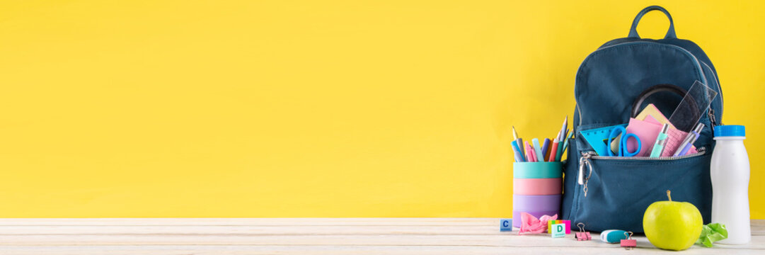 Back to School. School equipment high-colored bright flat lay