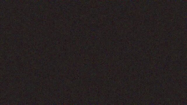Dark abstract texture with subtle noise pattern