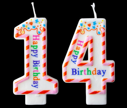 Number fourteen shaped birthday candle with colorful sprinkles and Happy Birthday text isolated on a black background