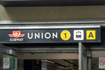 Fototapeta premium Toronto, Ontario, Canada - August 13, 2026: Entrance sign for Union Station Subway on Line 1 Yonge University of the Toronto Transit Commission (TTC) in Toronto, Ontario, Canada. 