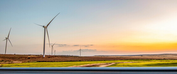 Wind turbines in the countryside, at dusk © Itsaso