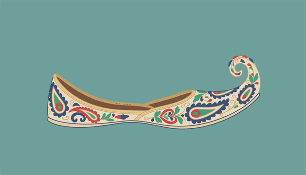 Elegant traditional indian mojari shoe with colorful paisley embroidery and curled toe tip over teal background.