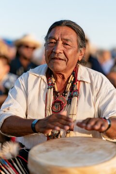 Cultural heritage celebration featuring traditional drum performance,National Native American Heritage Month