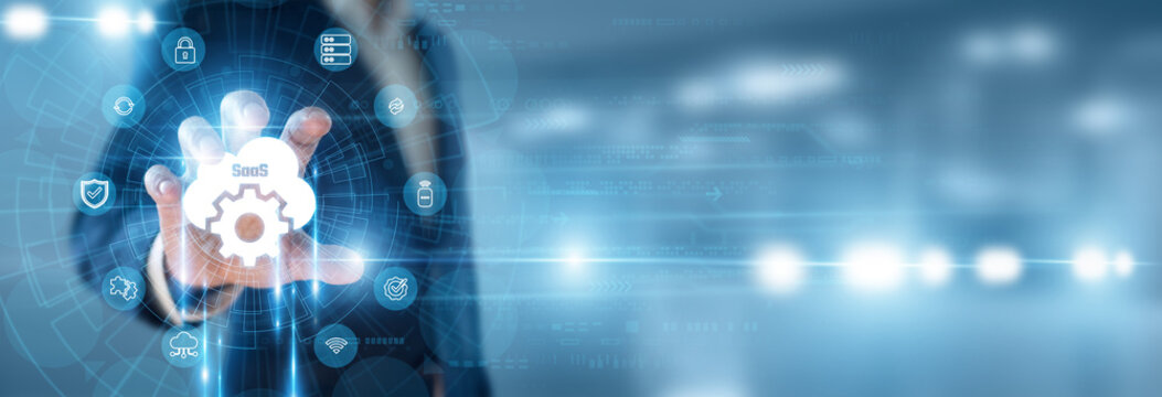 Cloud Product Manager hand holding SaaS and data networking, software as a service deployment, web application hosting infrastructure, digital subscription model, cloud computing system.