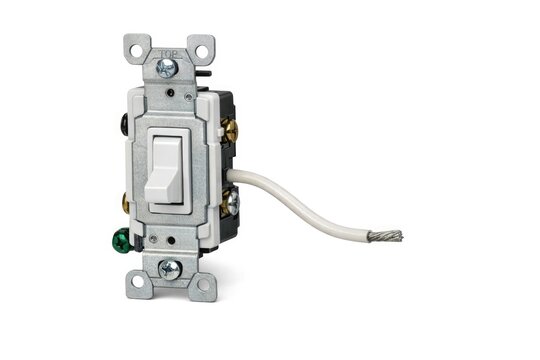 A single white light switch mounted on a white background, suitable for use in minimalist designs or as a neutral element in various scenes
