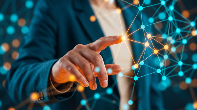 Close-up of a hand touching a glowing holographic network node