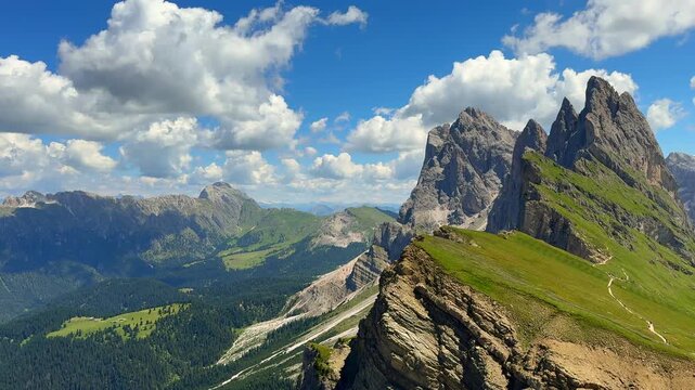  Seceda ridge in the Dolomites, highlighting jagged cliffs and green meadows