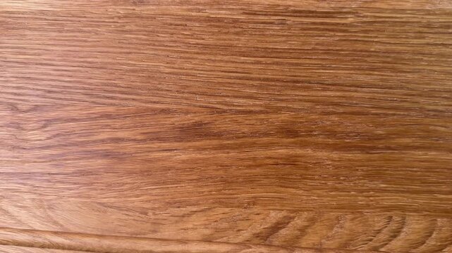 Work surface of oak cutting board with groove close-up
