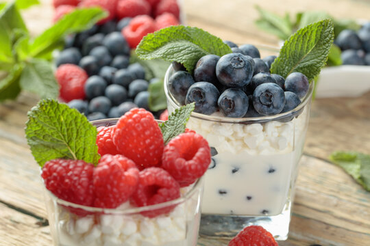 Curd dessert with berries and mint.