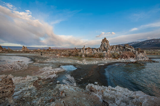 Beautiful wide view of unique tufa towers at Mono Lake under dramatic twilight sky