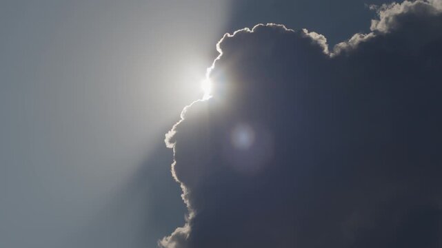 Sun appears from the cumulus cloud and starts shining