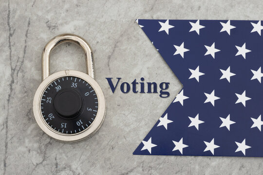 Voting text with black combination lock on marble with blue star banner for secure voting