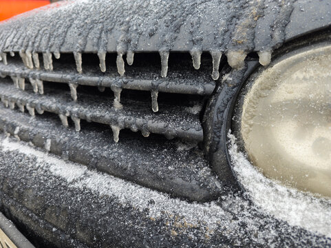 Frozen Vehicle Grille and Headlight in Winter Conditions