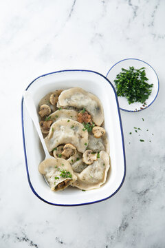 Homemade dumplings with mushrooms