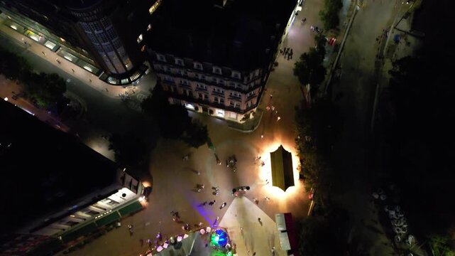 High Angle Night Footage of Illuminated Buildings and Roads with Traffic at Best Tourist Attraction Destination of England at Bournemouth City with Sandy Beach and Ocean of Great Britain, 