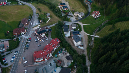 Obraz premium Aerial view of rural road, road junction in a mountain village