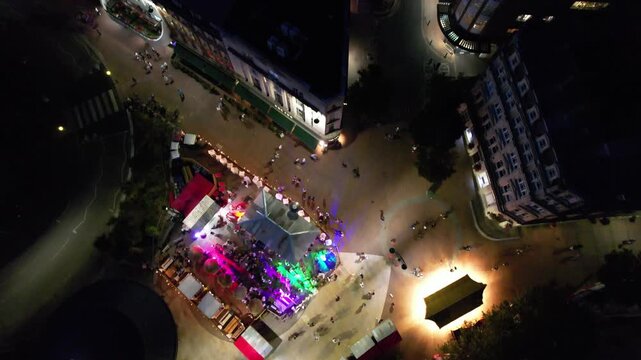High Angle Night Footage of Illuminated Buildings and Roads with Traffic at Best Tourist Attraction Destination of England at Bournemouth City with Sandy Beach and Ocean of Great Britain, 