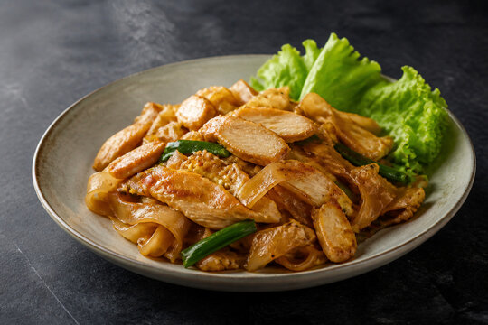 Thai kuay teow kua gai noodles with chicken and egg