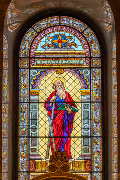 Stained glass window of Saint Andrew the Apostle holding a book inside Saint Stephen's Basilica in Budapest, Hungary