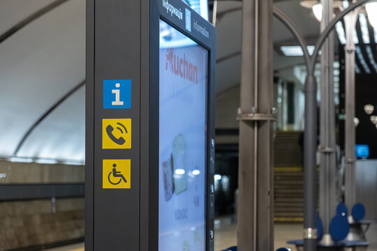 Kyiv, Ukraine - March 15, 2026: A digital information kiosk with navigation icons in a modern subway station, providing essential public transit guidance and accessibility help