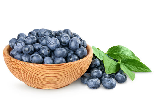 blueberry in wooden bowl isolated on white background