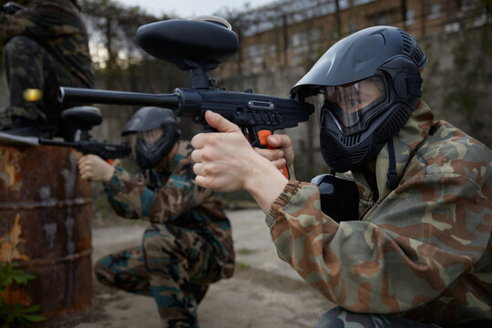 Soldiers take defensive positions and preparing for the attack during paintball tactical training