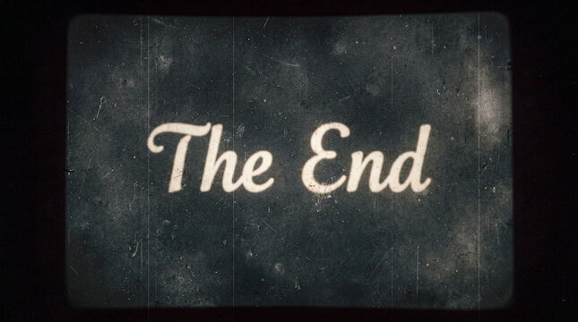Un fotograma de pel&iacute;cula retro, con grano y ara&ntilde;azos, que muestra el texto 'THE END' en letras blancas envejecidas sobre un fondo negro desgastado y con agujeros de arrastre en los bordes.