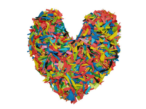 Colorful heart shape made of small sugar sprinkles isolated isolated on white background