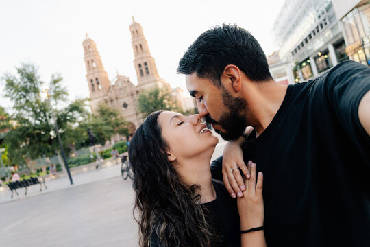 Couple taking a selfie outdoors