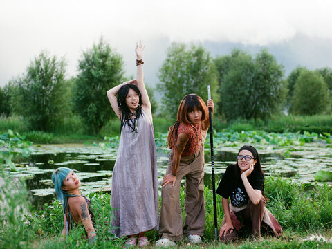 Group of Female Friends by a Lotus Pond