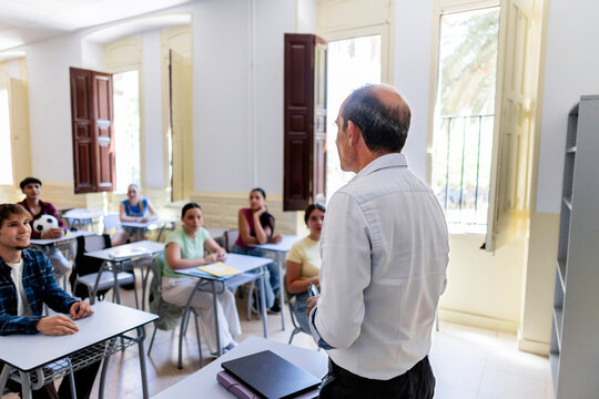 Teacher educating diverse students in a classroom