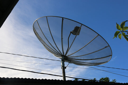 Large Satellite Dish Antenna Against Clear Blue Sky for Telecommunication and Wireless Communication