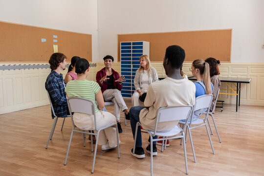 Diverse students participating in group therapy discussion session