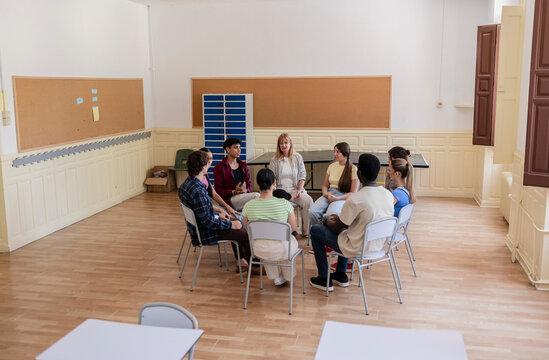 Diverse group of young adults participating in discussion