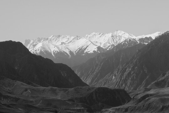 Layers of Mountains: A Grand Geographic Narrative in Black and White.
