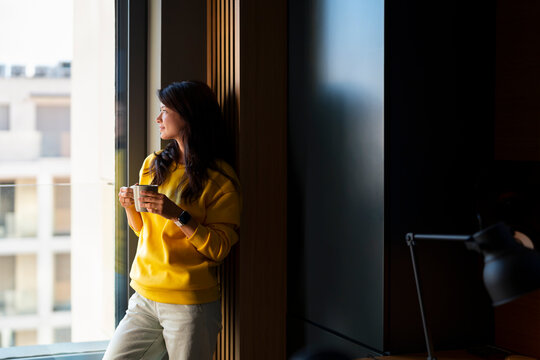 Coffee Break by Window