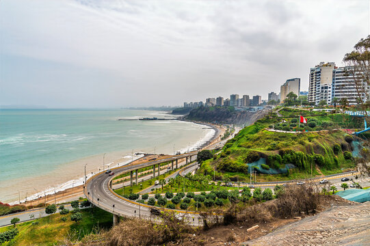 A view north along the coast from beside the Peace footbridge in Miraflores, Lima, Peru in the dry season