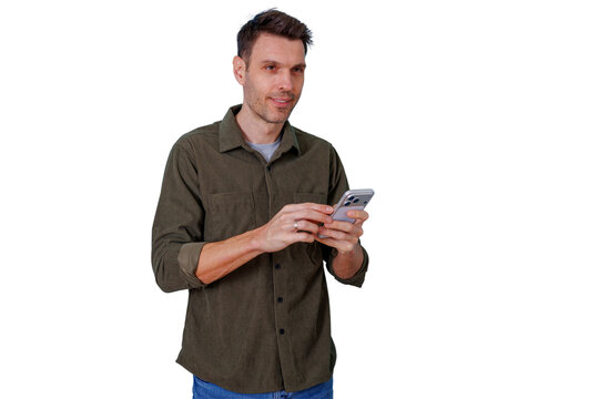 Young man smiling, using smartphone, browsing social media, texting, connecting online, transparent background