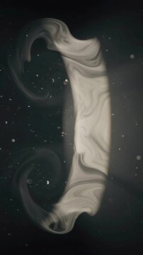 Abstract flowing white ink swirls in dark water creating a mysterious ethereal atmosphere.