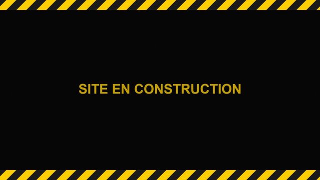 Site en construction sign with yellow and black hazard warning stripes