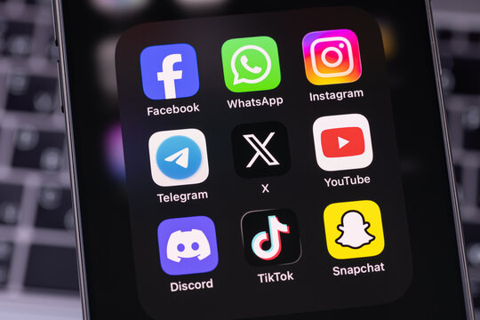 smartphone iPhone with mobile icon apps Facebook, WhatsApp, Instagram, Telegram, X, YouTube, TikTok, Snapchat. Most popular social media platform. Batumi, Georgia - June 17, 2026