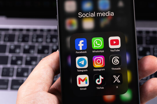 smartphone iPhone with mobile icon apps Facebook, WhatsApp, Instagram, Telegram, YouTube, TikTok, Gmail, X. Most popular social media platform. Batumi, Georgia - June 17, 2026
