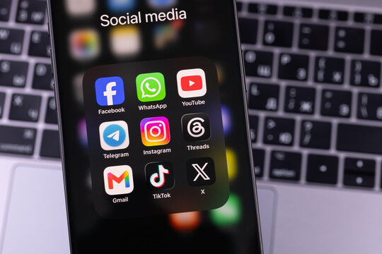 smartphone iPhone with mobile icon apps Facebook, WhatsApp, YouTube, Telegram, Instagram, Threads, Gmail, TikTok, X. Most popular social media platform. Batumi, Georgia - June 17, 2026