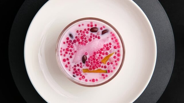 Sago in Fresh Milk.Sago pearl with black bean ,pumpkin and young coconut in fresh milk.Thai dessert.Top view.