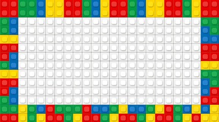Fototapeta premium Empty white LEGO baseplate grid surrounded by colorful plastic bricks for creative building and design projects