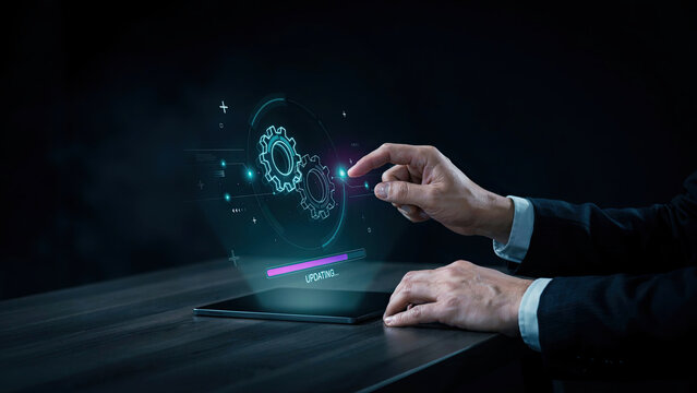 Business person touching digital screen interface with gear icons representing system software update progress bar process